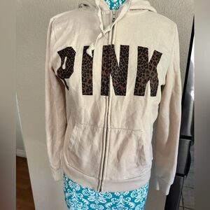 Vintage Y2K PINK hoodie with animal print logo. Winter wear